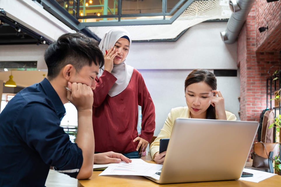 Asian-business-colleagues-getting-stress-fear-of-disappointing-others