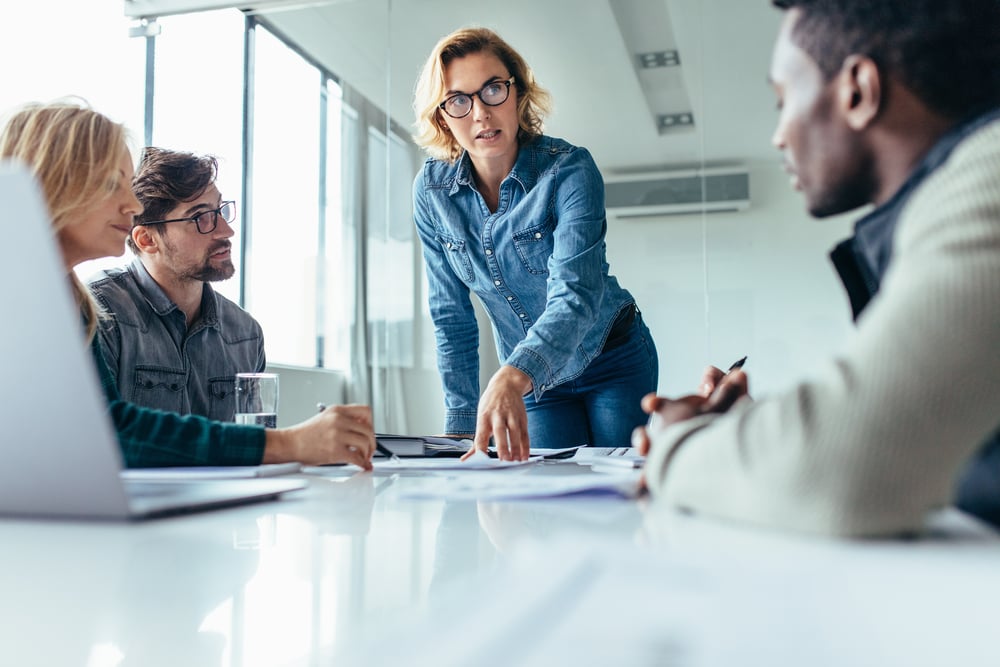 Blonde-woman-leadring-a-meeting-work-life-balance-in-startups