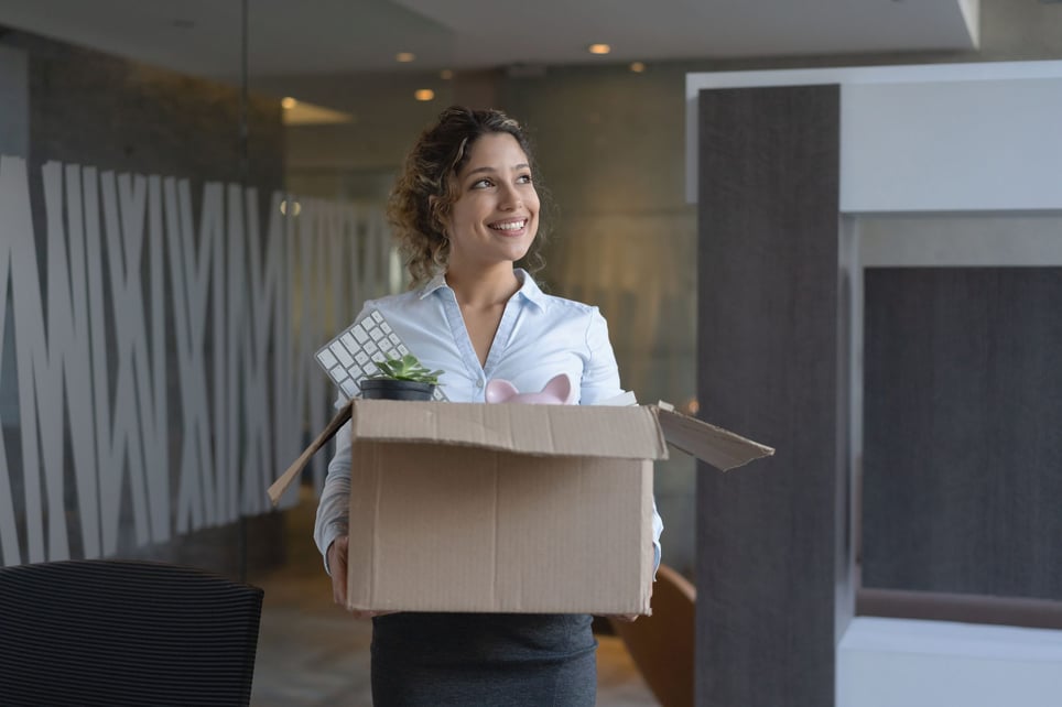 Business-woman-moving-into-a-new-office-how-to-quit-a-part-time-job