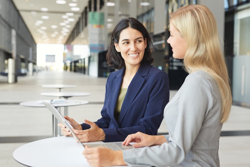 Business-woman-talking-standing-tell-us-about-yourself