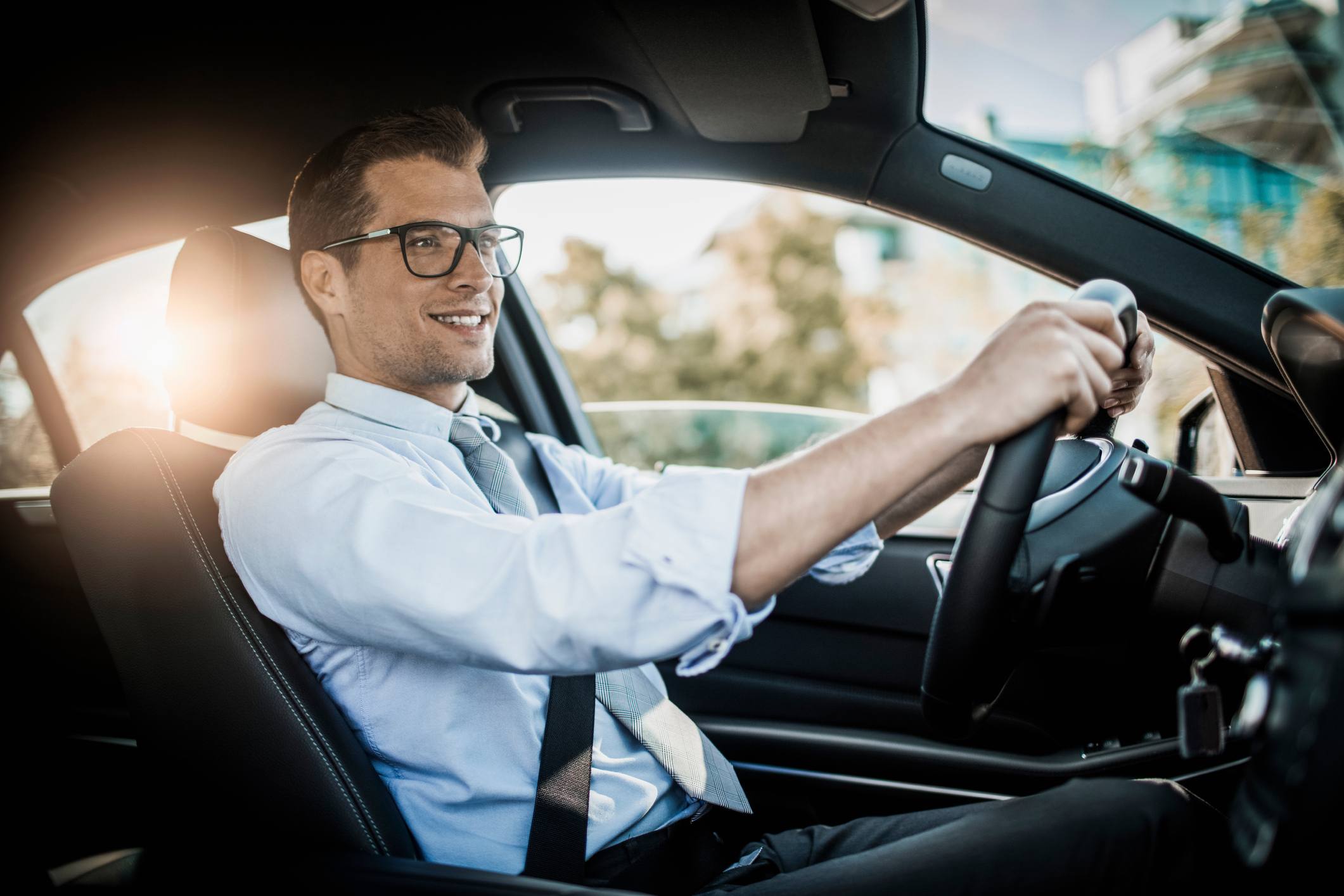 Businessman-driving-a-car-causes-of-workplace-stress