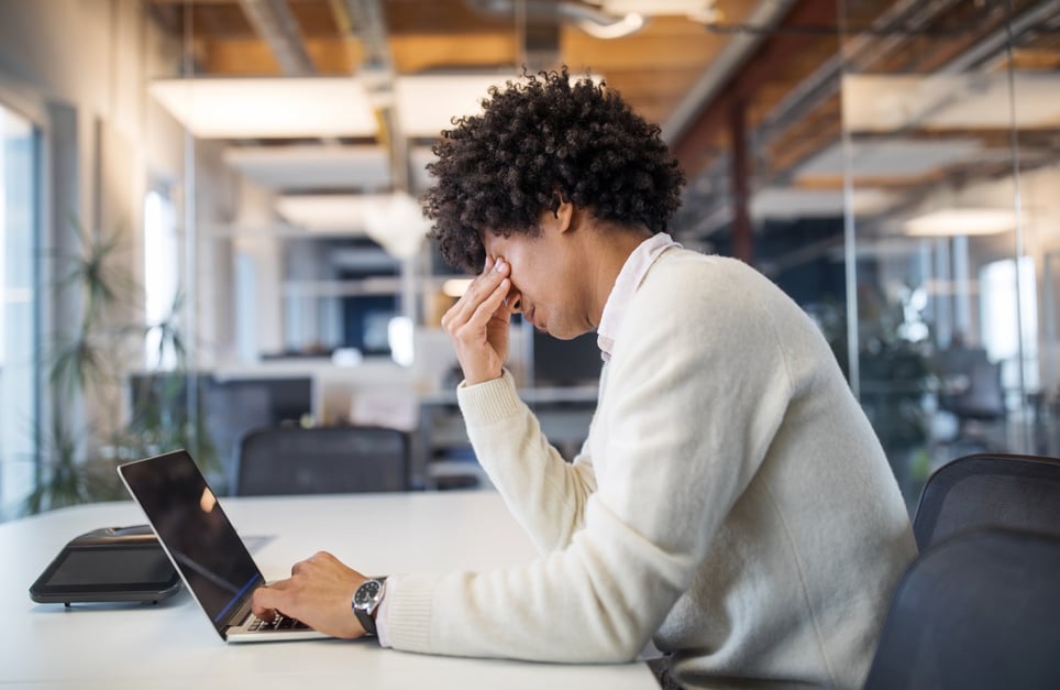 Businessman-working-late-in-office-what-are-stressors