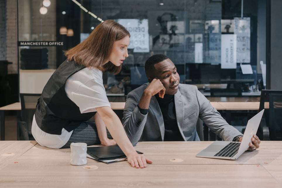 Businesswoman-pressuring-colleague-sitting-over-his-shoulder-at-workplaceBusinesswoman-pressuring-colleague-sitting-over-his-shoulder-at-workplace-extrinsic-motivation