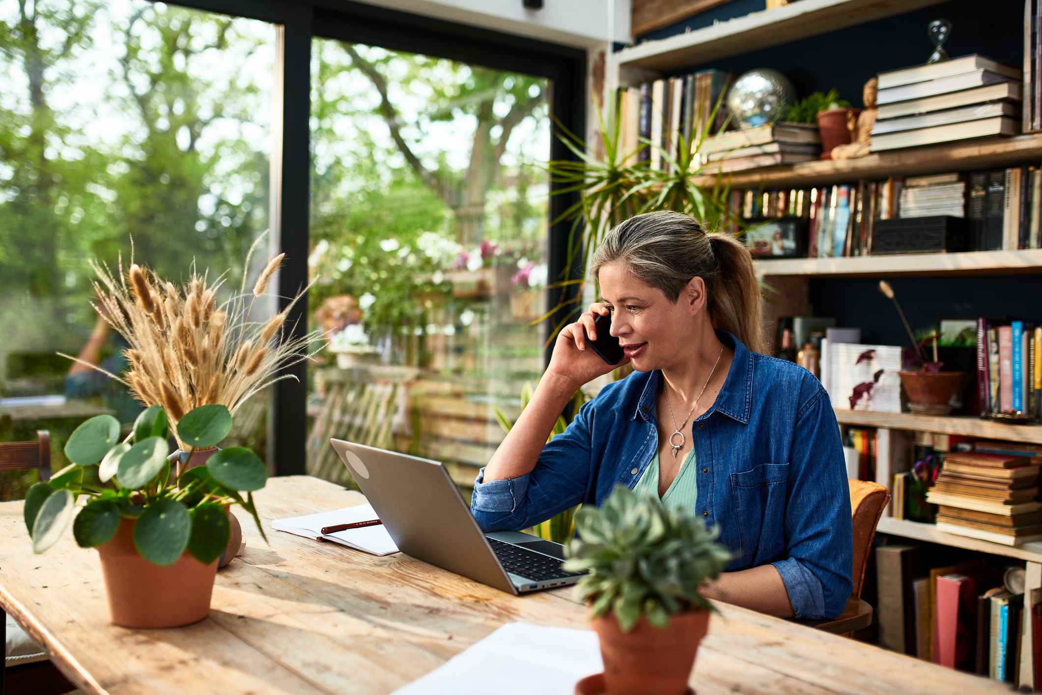 Businesswoman-using-mobile-phone-why-do-you-want-this-job