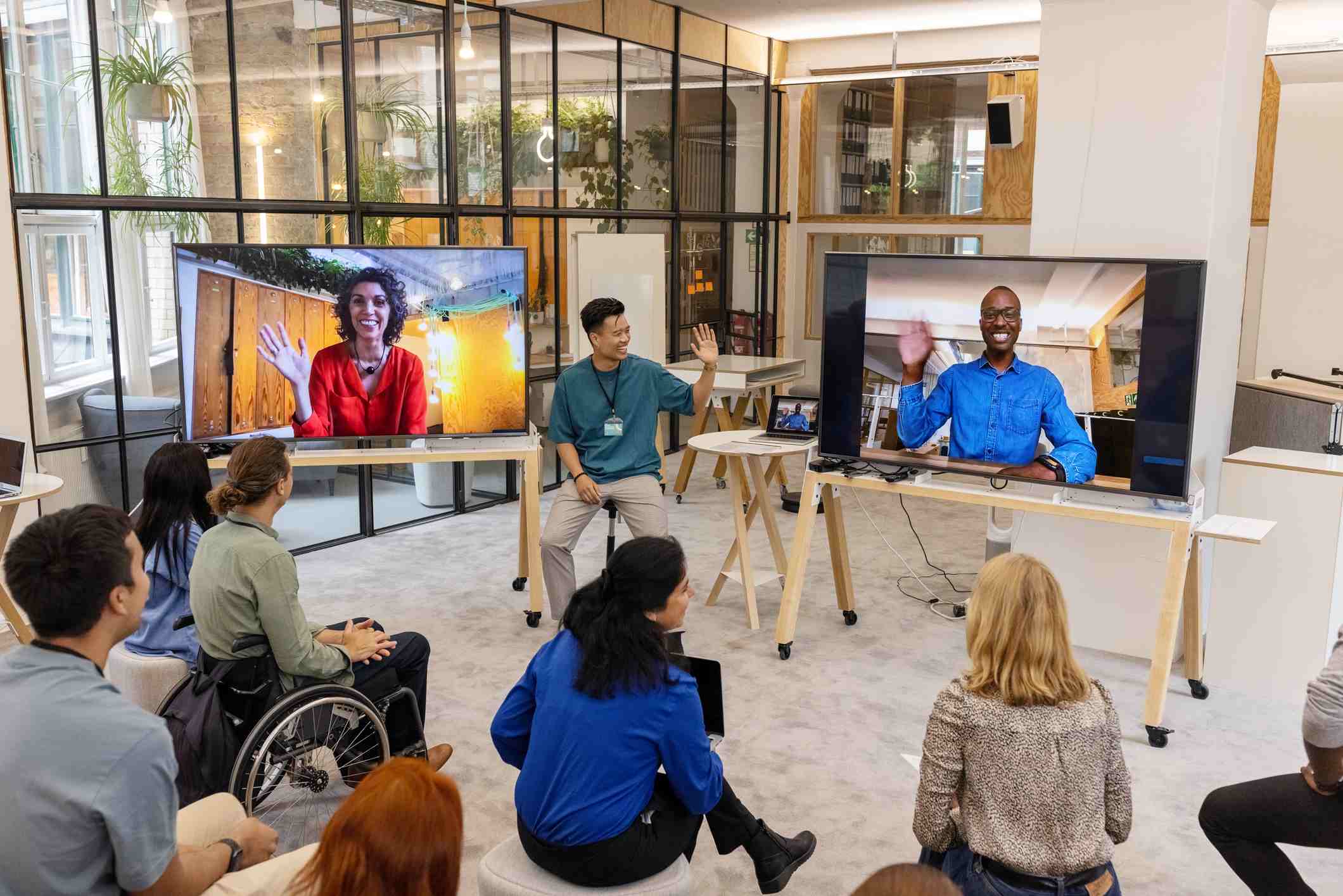 Collegues-laughing-at-team-meeting-love-languages-at-work