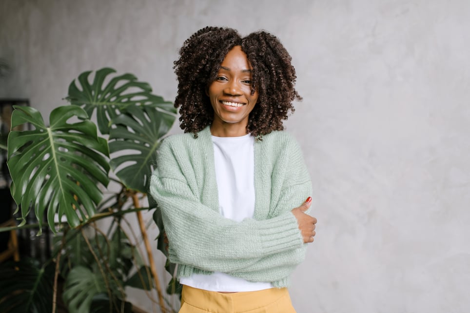 Confident-black-woman-smiling-on-camera-how-to-overcome-insecurities