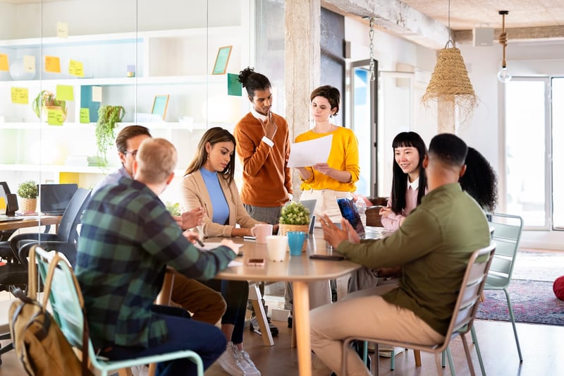 Coworkers-Working-Together-In-Office-1