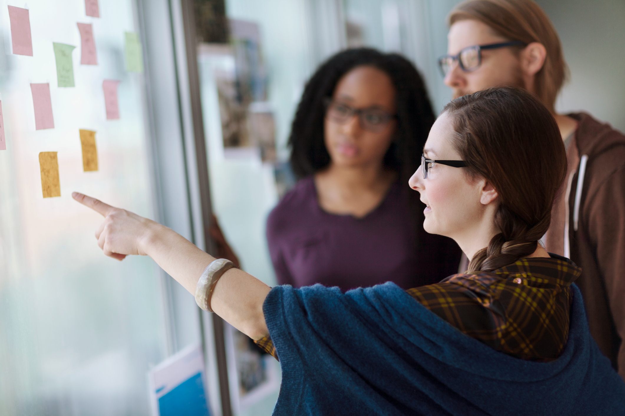 Creative-colleagues-reviewing-ideas-how-to-find-a-mentor