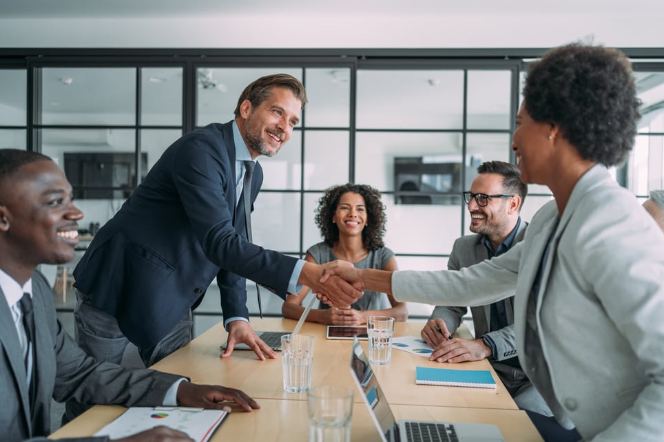 Group-of-diverse-coworkers-agreeing-to-deal-internal-candidate