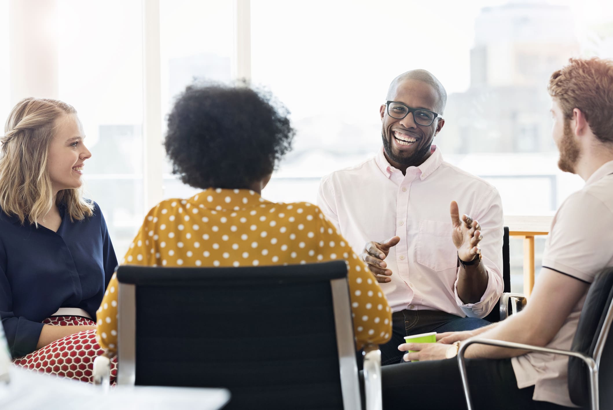 Group-of-happy-coworkers-participate-in-roundtable-explicit-knowledge