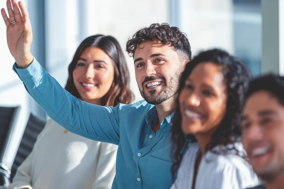 Group-of-people-listening-to-a-presentation-off-the-job-training