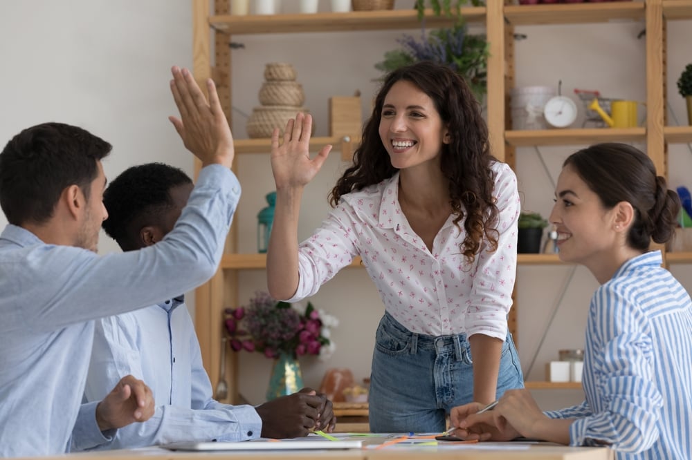 Group-of-workers-happy-in-a-meeting-examples-of-motivation-and-inspiration