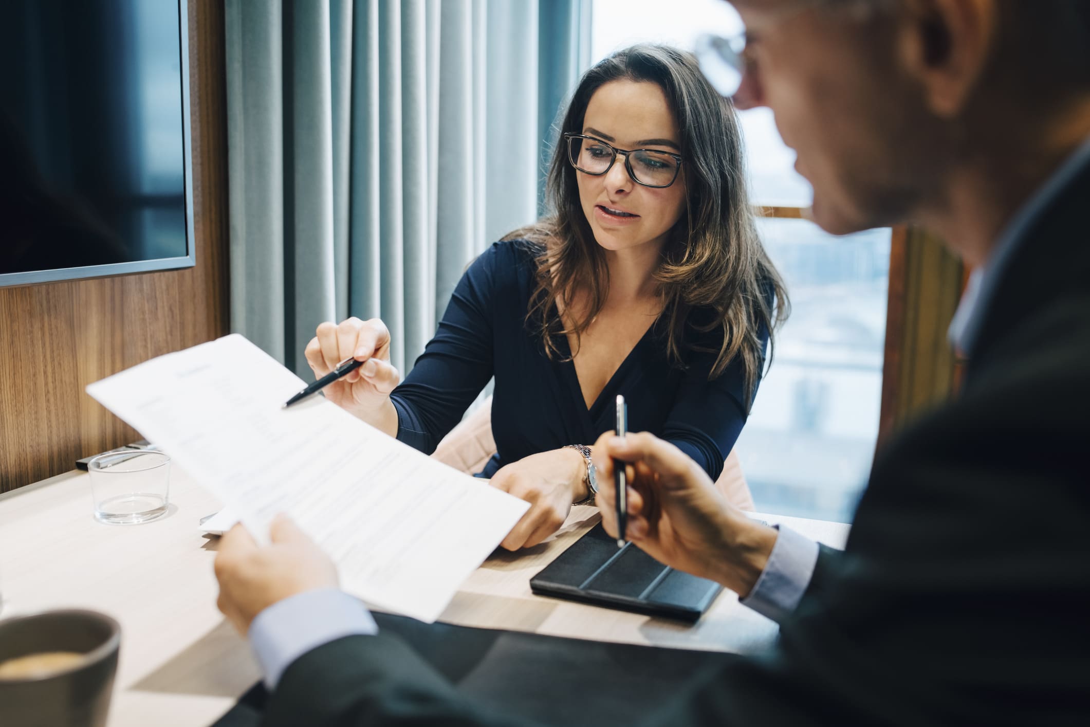 Legal-team-discussing-policy-terms-work-from-home-policy