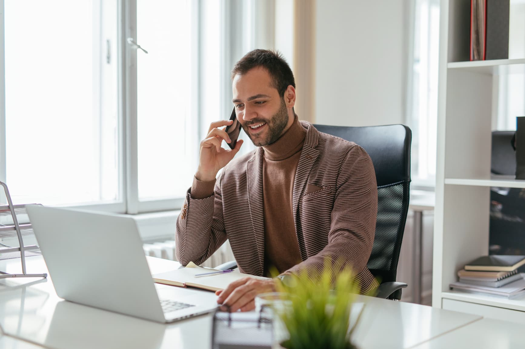 Man-Smiling-And-Talking-On-The-Phone-phone-anxiety