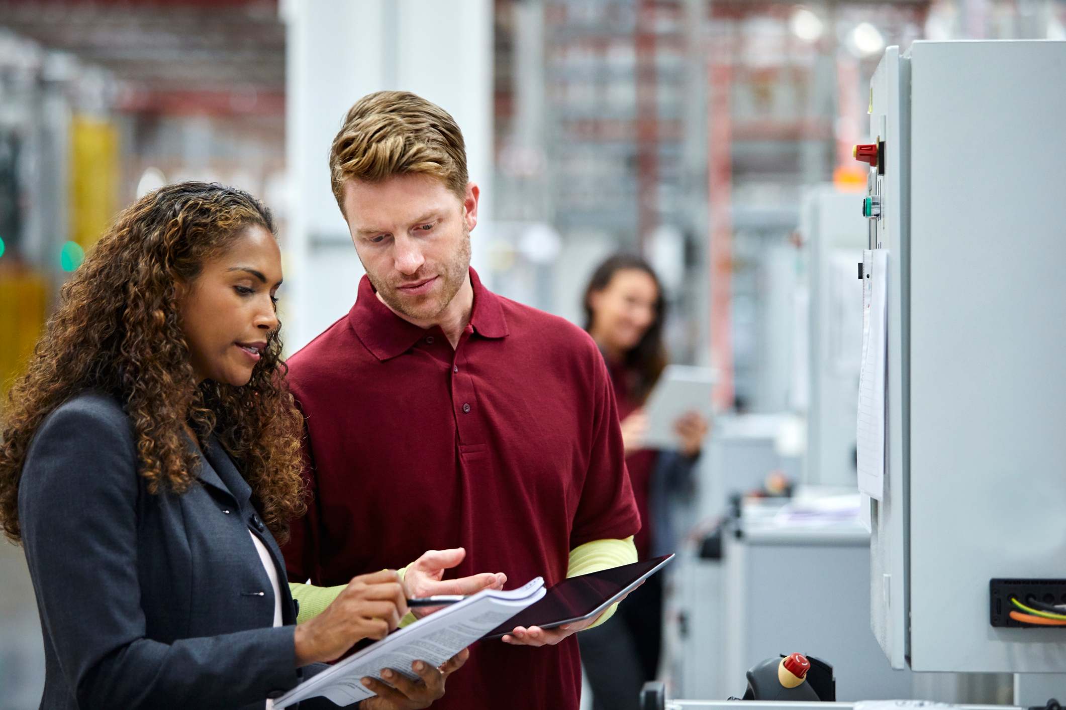 Man-and-woman-looking-at-printed-test-results-at-office-personality-test-for-workplace