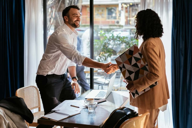 Man-and-woman-meeting-each-other-for-interview