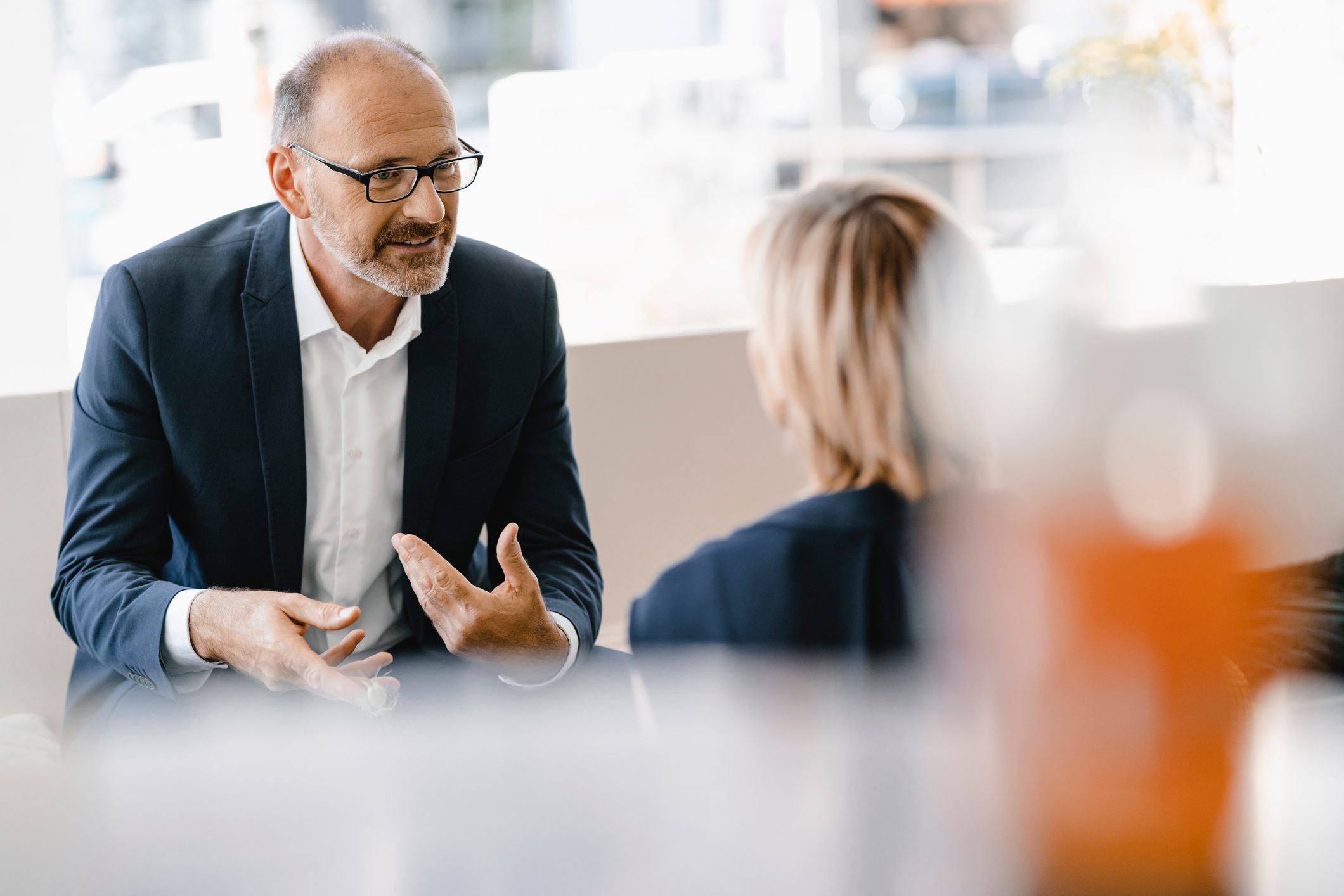 Man-at-client-meeting-is-hourly-or-salary-better