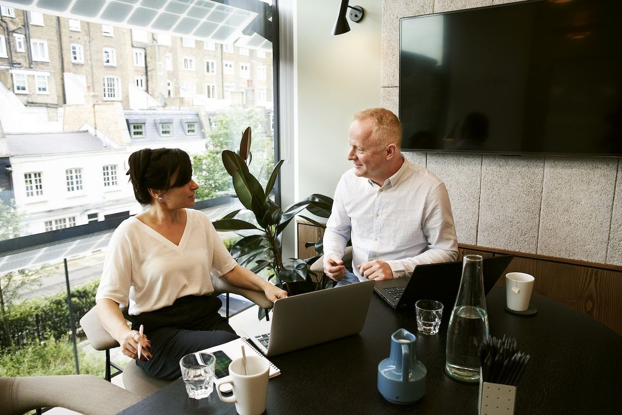 Man-at-meeting-with-financial-advisor-how-to-budget