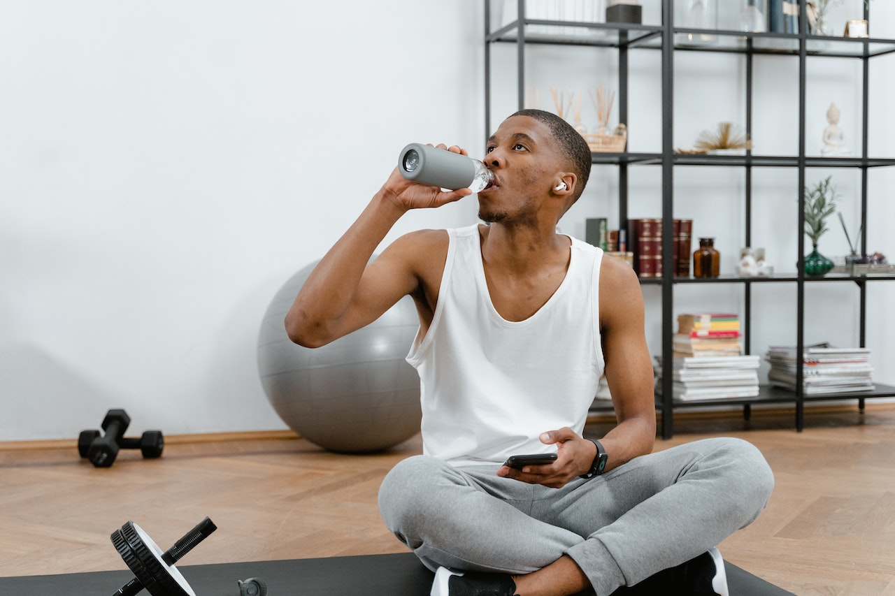 Man-drinking-water-after-workout-how-towake-yourself-up