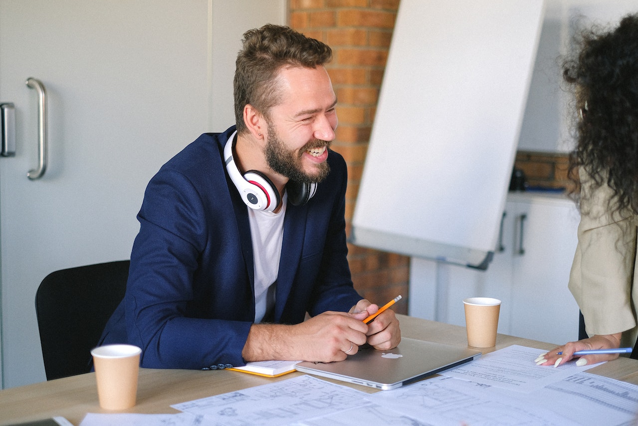 Man-laughing-at-office-7-38-55-rule