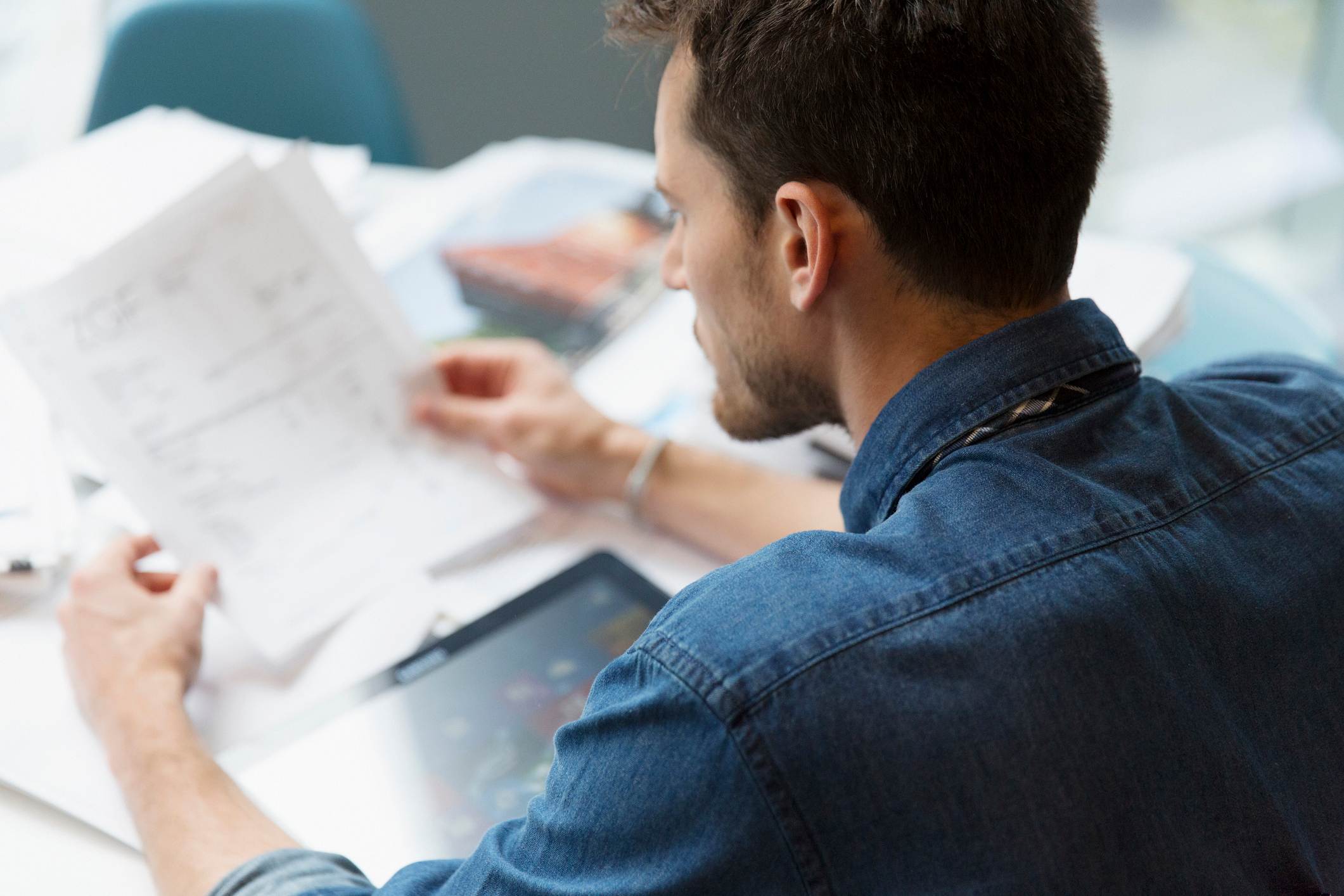 Man-looking-at-light-workload-worried-about-getting-fired