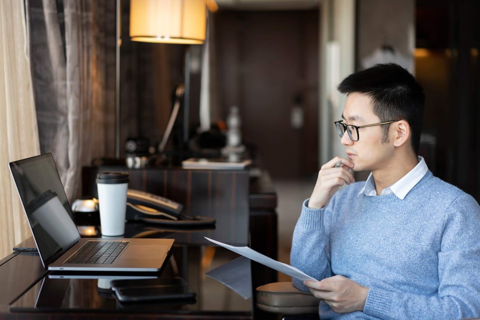 Man-with-laptop-looking-for-jobs-at-home-best-places-to-look-for-jobs