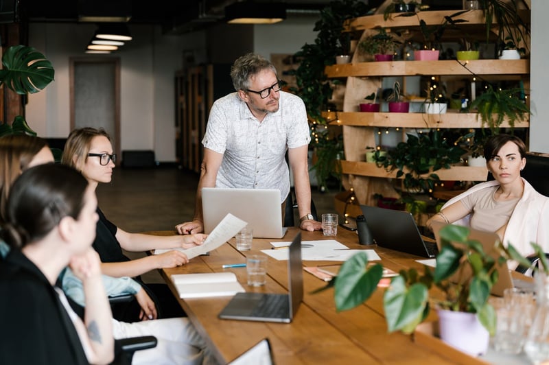 Mature-Leader-Listening-To-Employees