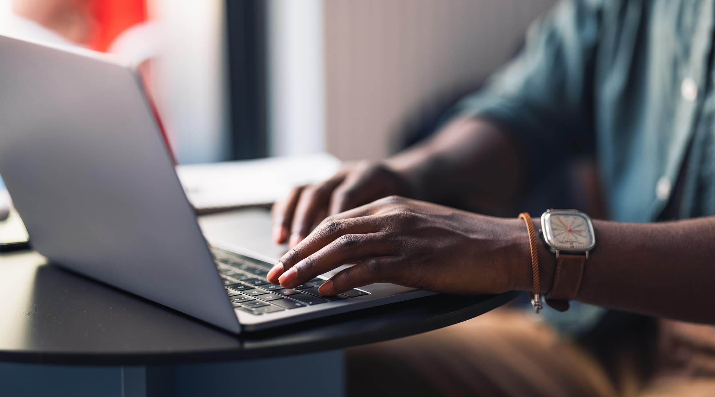 Men-using-his-laptop-how-to-manage-two-jobs-at-once