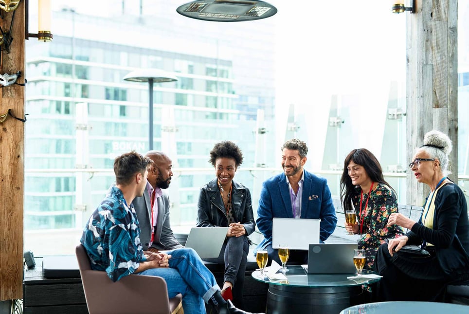 Multi-racial-business-colleagues-talking-how-to-set-boundaries-at-work