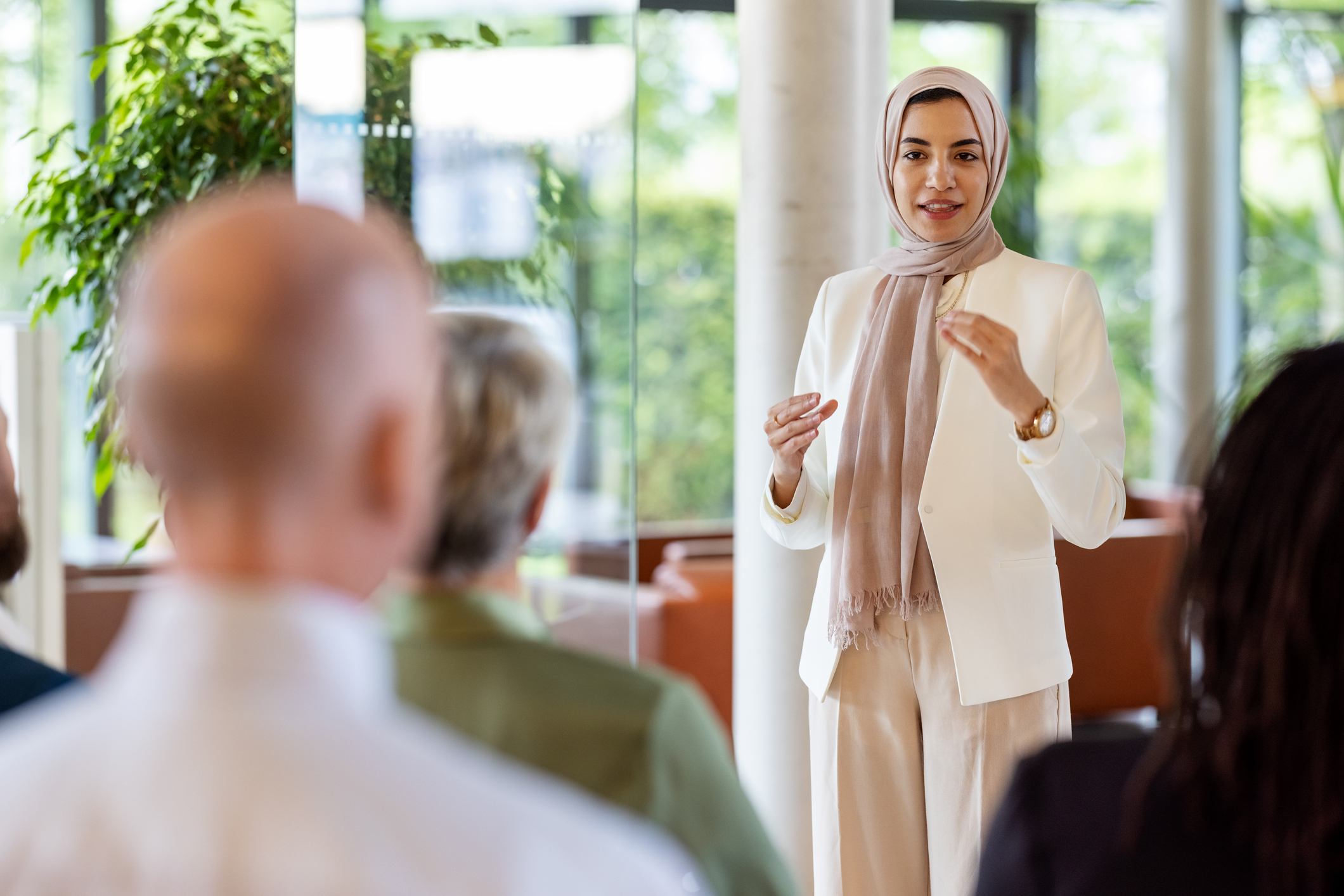 Muslim-businesswoman-giving-a-conference-self-knowledge-examples