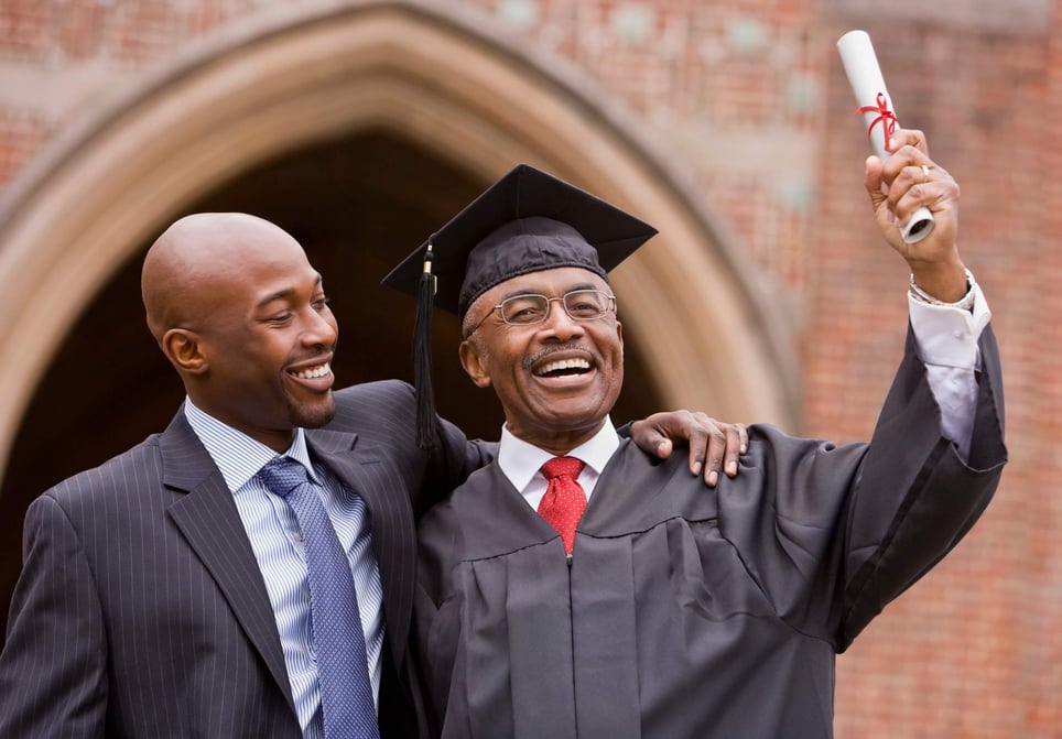 Older-man-celebrating-his-masters-degree-graduation-with-son-is-a-masters-degree-worth-it