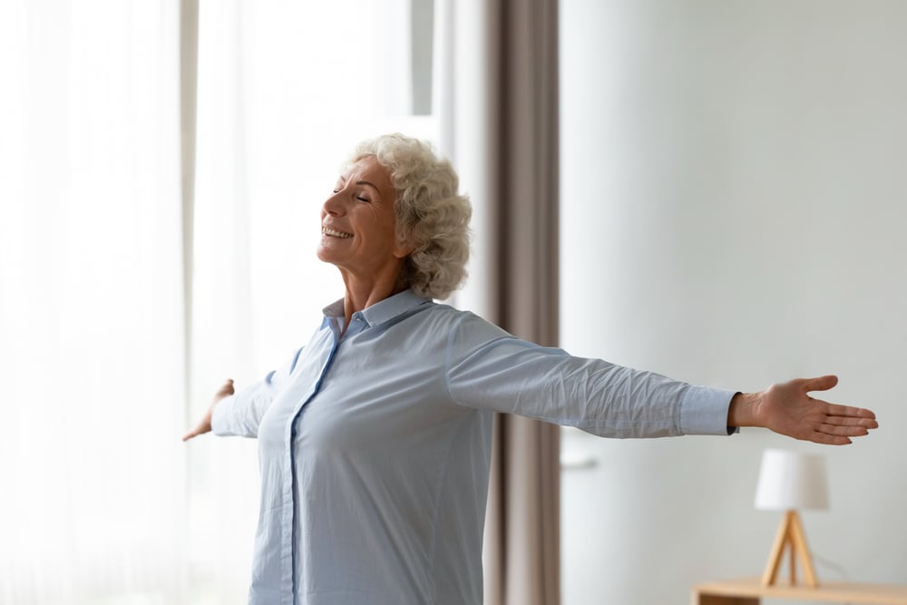 Overjoyed-old-woman-stretch-hands-feel-positive-endurance-vs-resilience