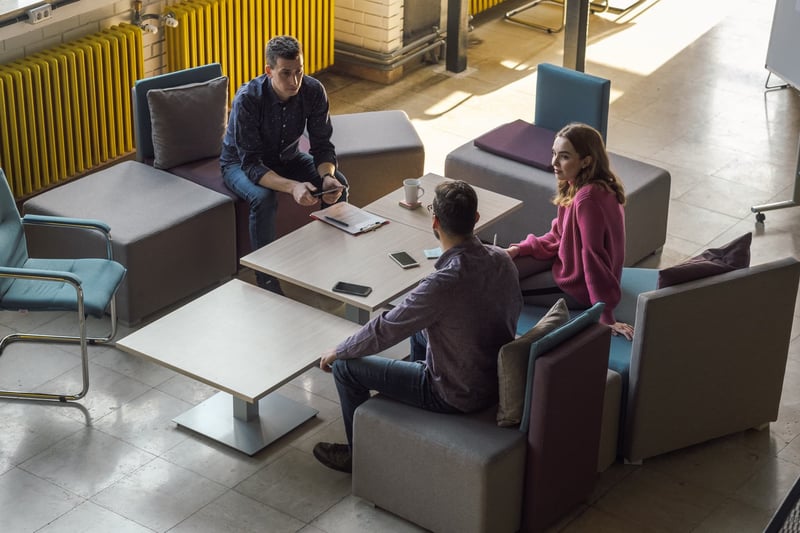 People-Discussing-In-Office-what-is-the-open-door-policy-workplace