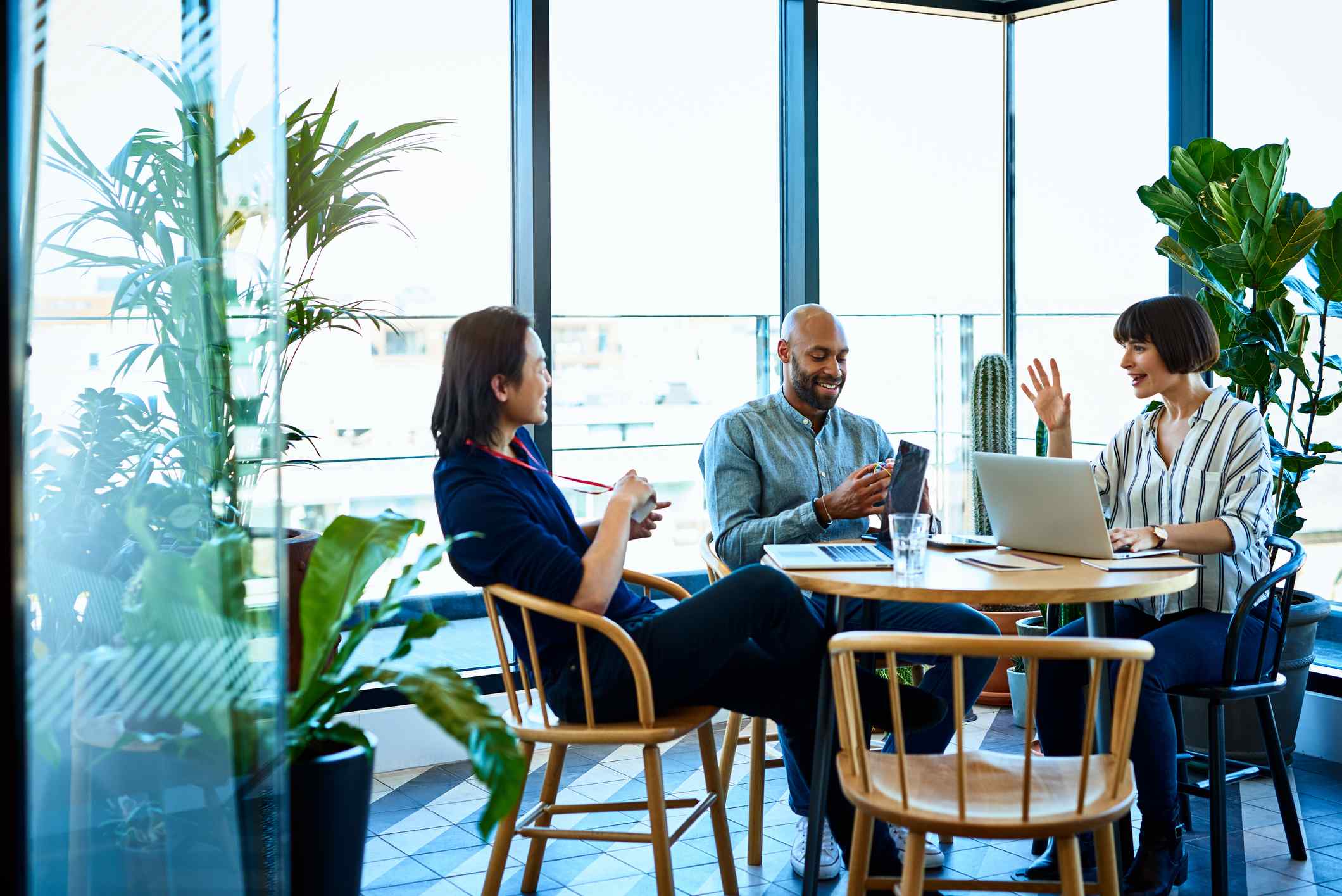 Relaxed-business-colleagues-meeting-how-to-set-boundaries-at-work