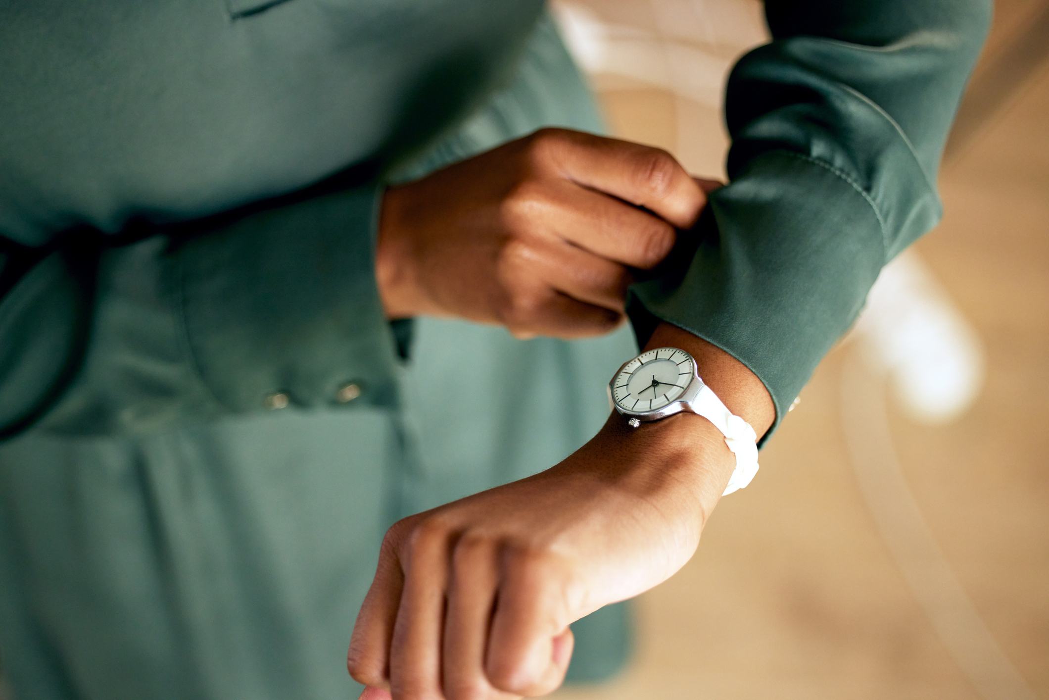 Shot-of-a-businesswoman-looking-at-her-watch-how-to-get-noticed-by-upper-management