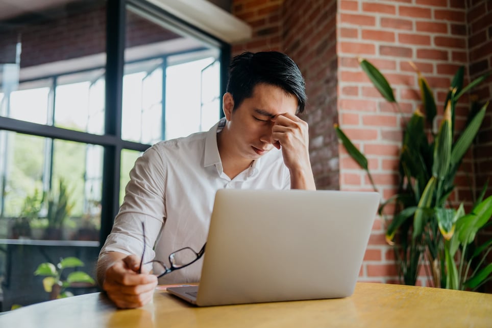 Stressed-and-tired-young-businessman-biofeedback-for-stress