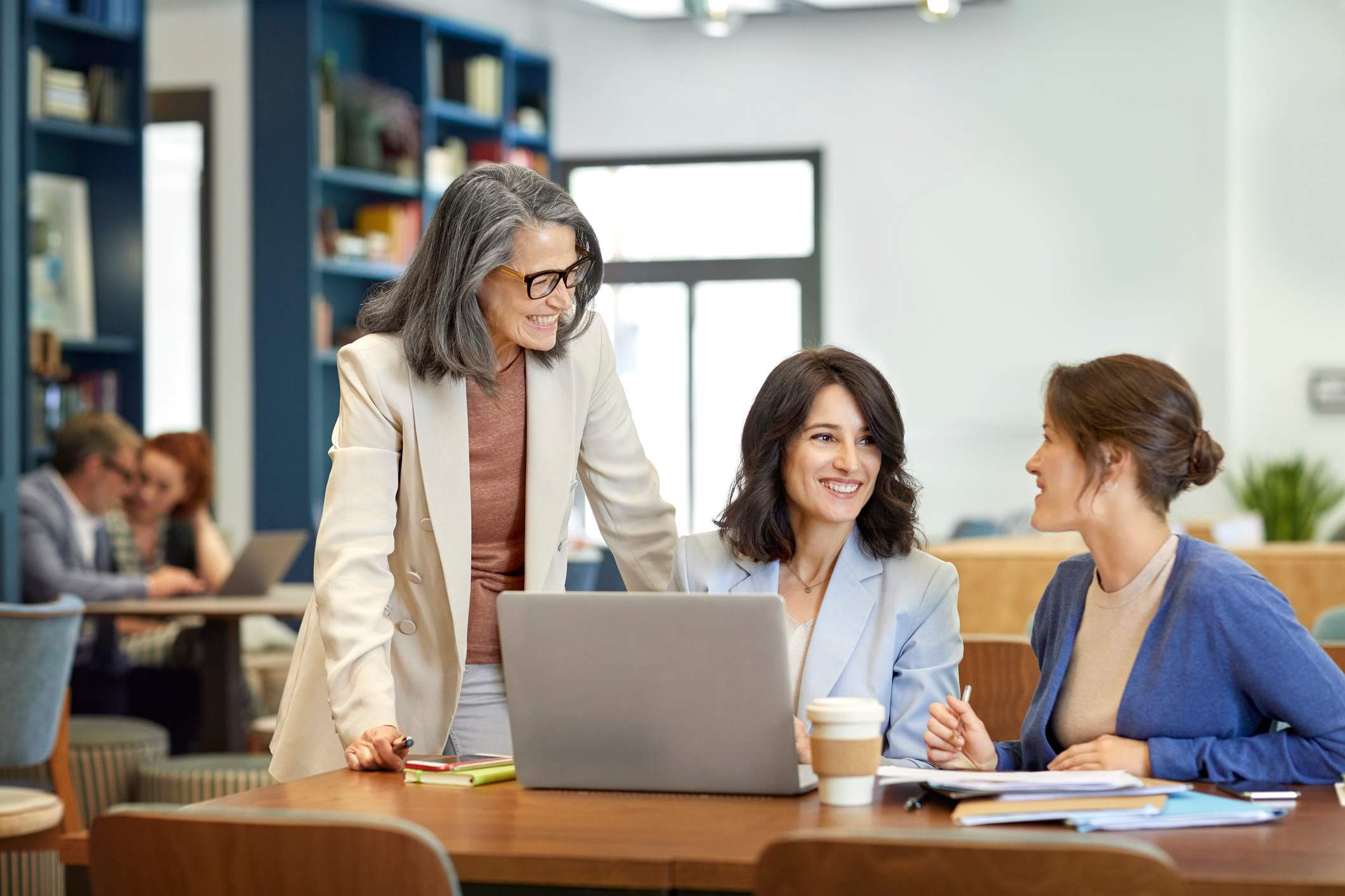 Three-coworkers-happy-at-work-employee-value-proposition