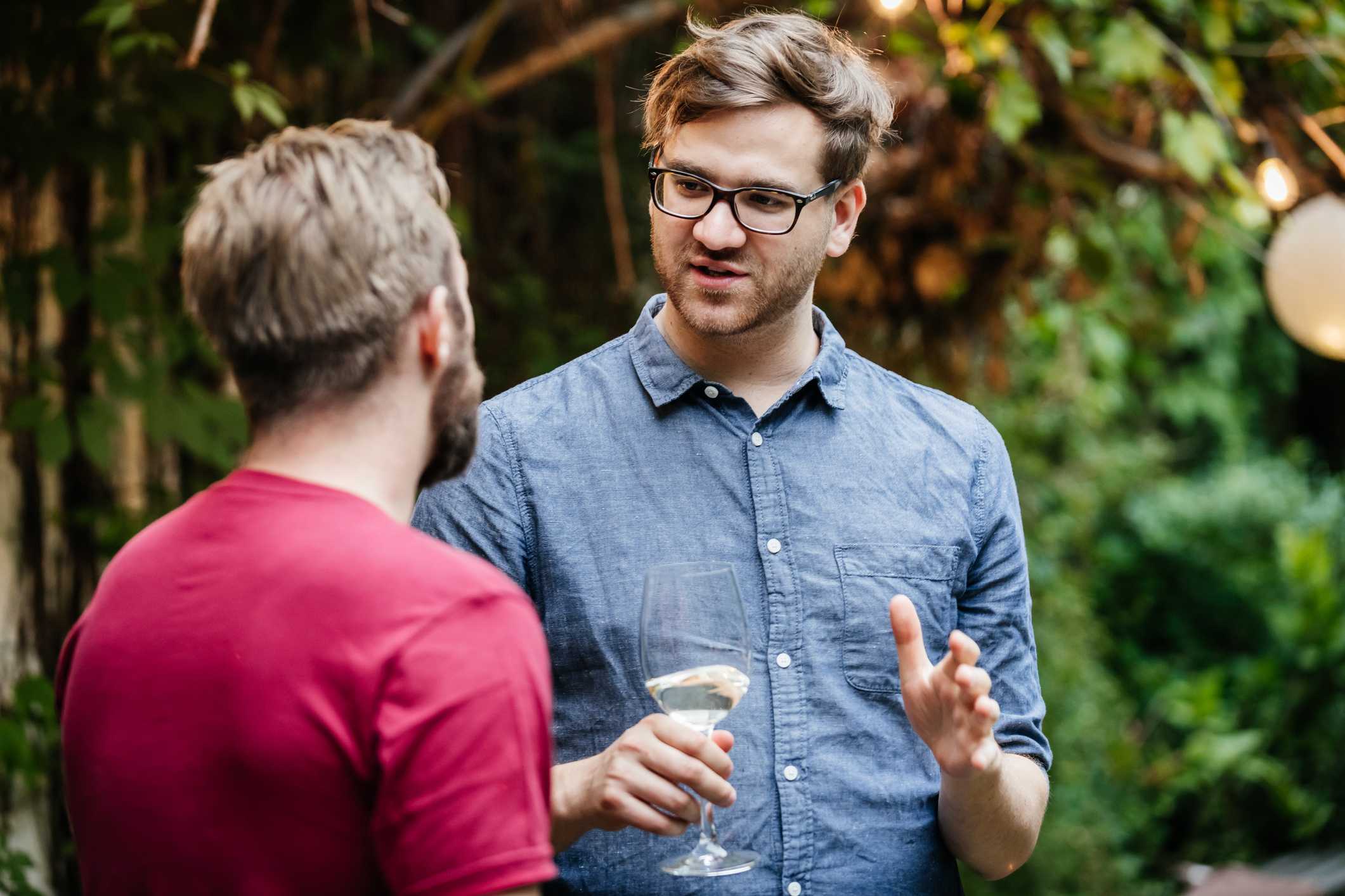 Two-men-at-bbq-having-a-deep-conversation-how-to-know-if-im-oversharing