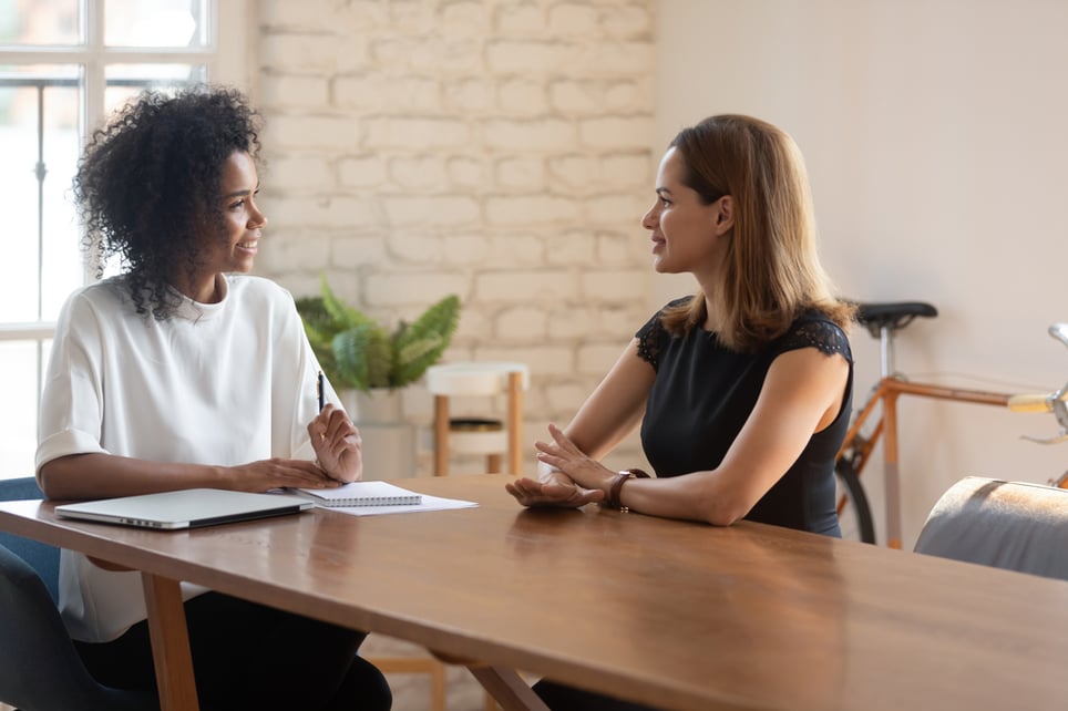 Two-woman-talking-tell-us-about-yourself