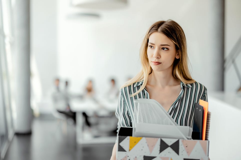 Upset-businesswoman-with-cardboard-box-worst-jobs-during-recession