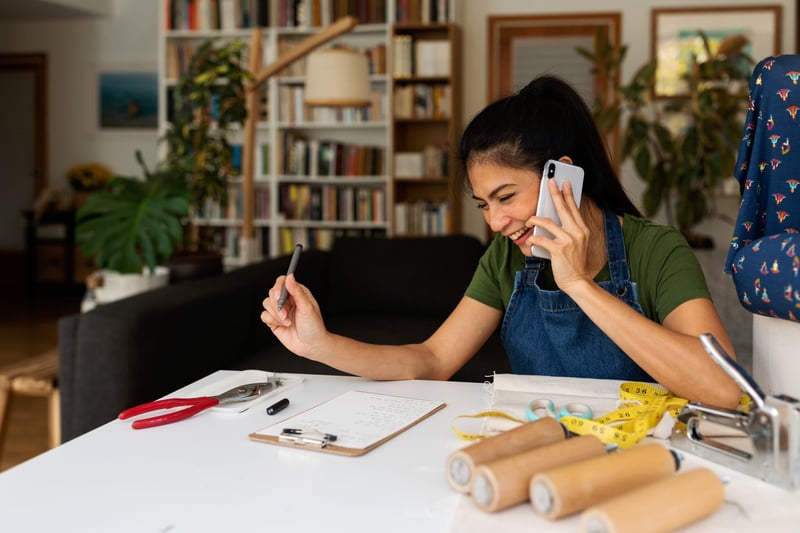 Woman-Calling-By-Phone-At-Home