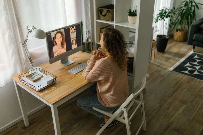 Woman-Having-Online-Video-Meeting-At-Home-1