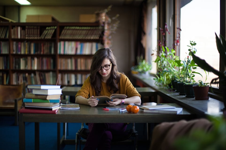 Woman-Studying-At-The-Library-career-choice