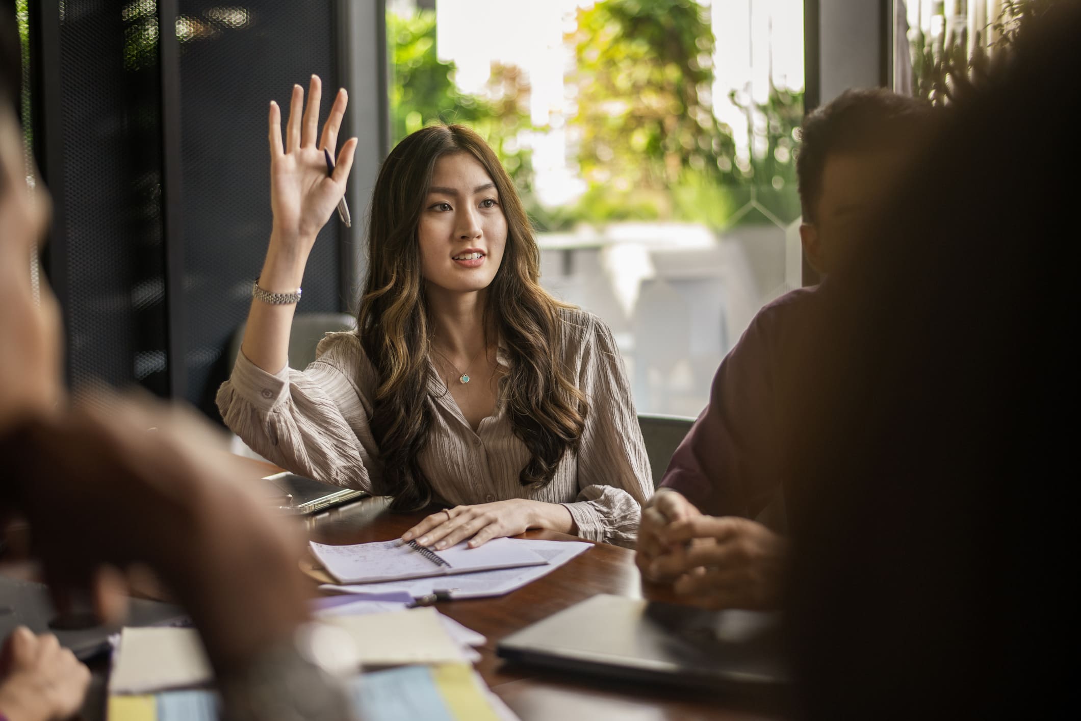 Woman-asking-questions-at-a-meeting-dead-end-job