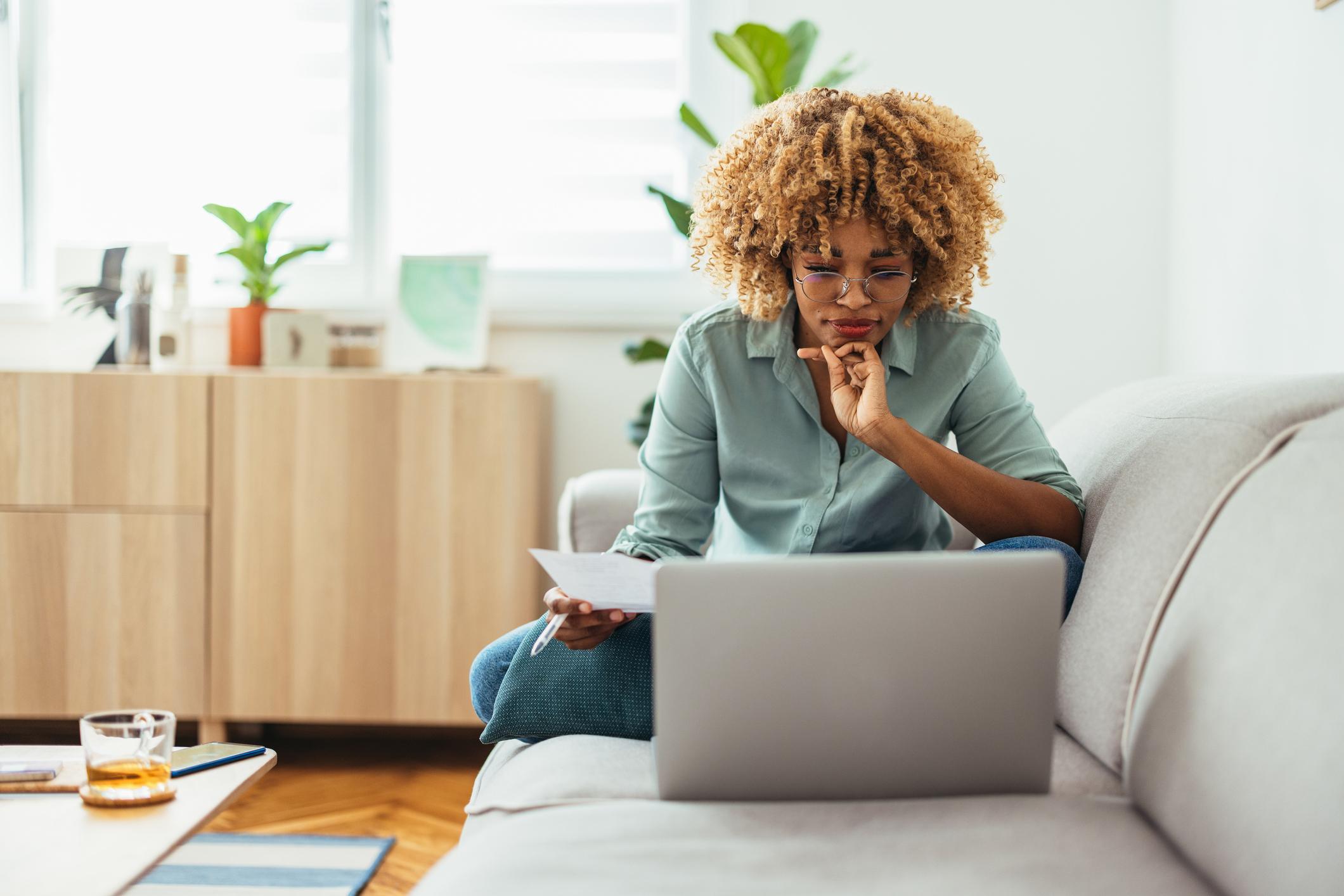 Woman-at-home-doing-research-in-her-laptop-internal-interview-questions