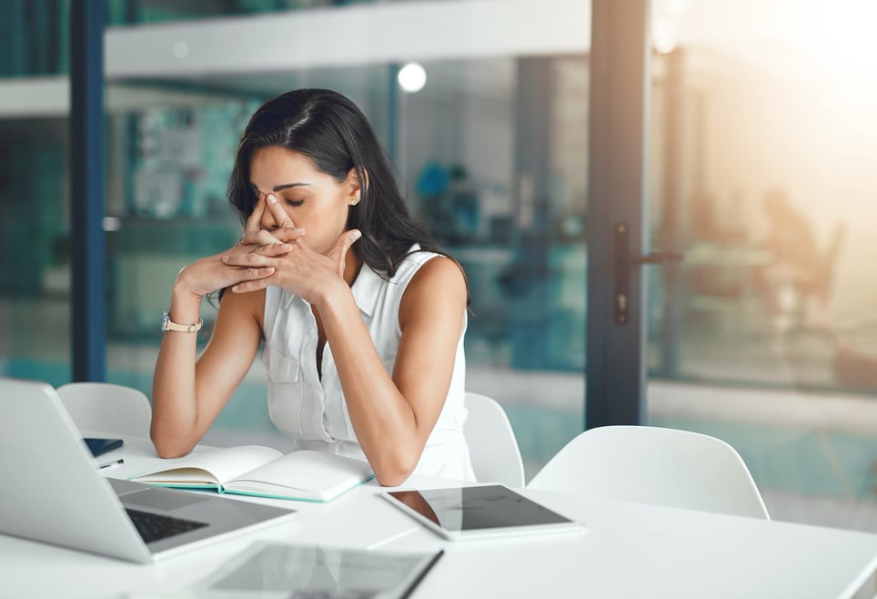 Woman-at-work-feeling-upset-bad-day-at-work