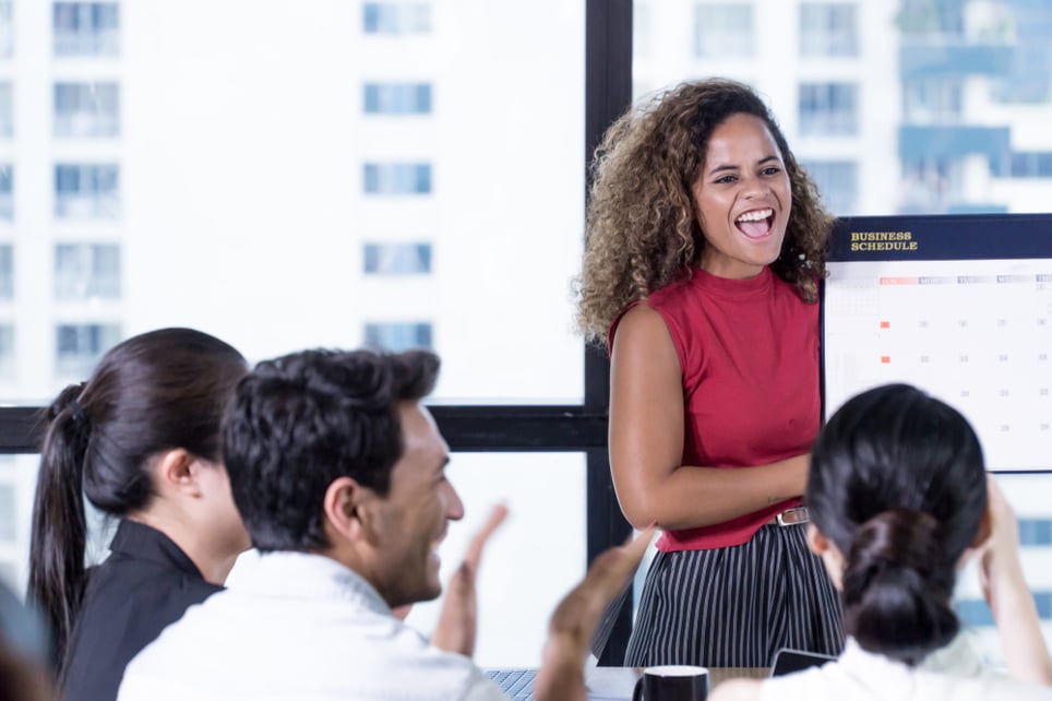 Woman-holding-a-business-schedule-board-work-life-balance-for-managers