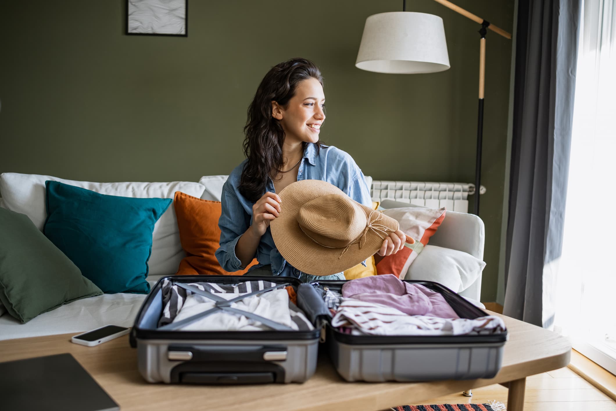 Woman-preparing-for-a-trip-unlimited-pto-pros-and-cons