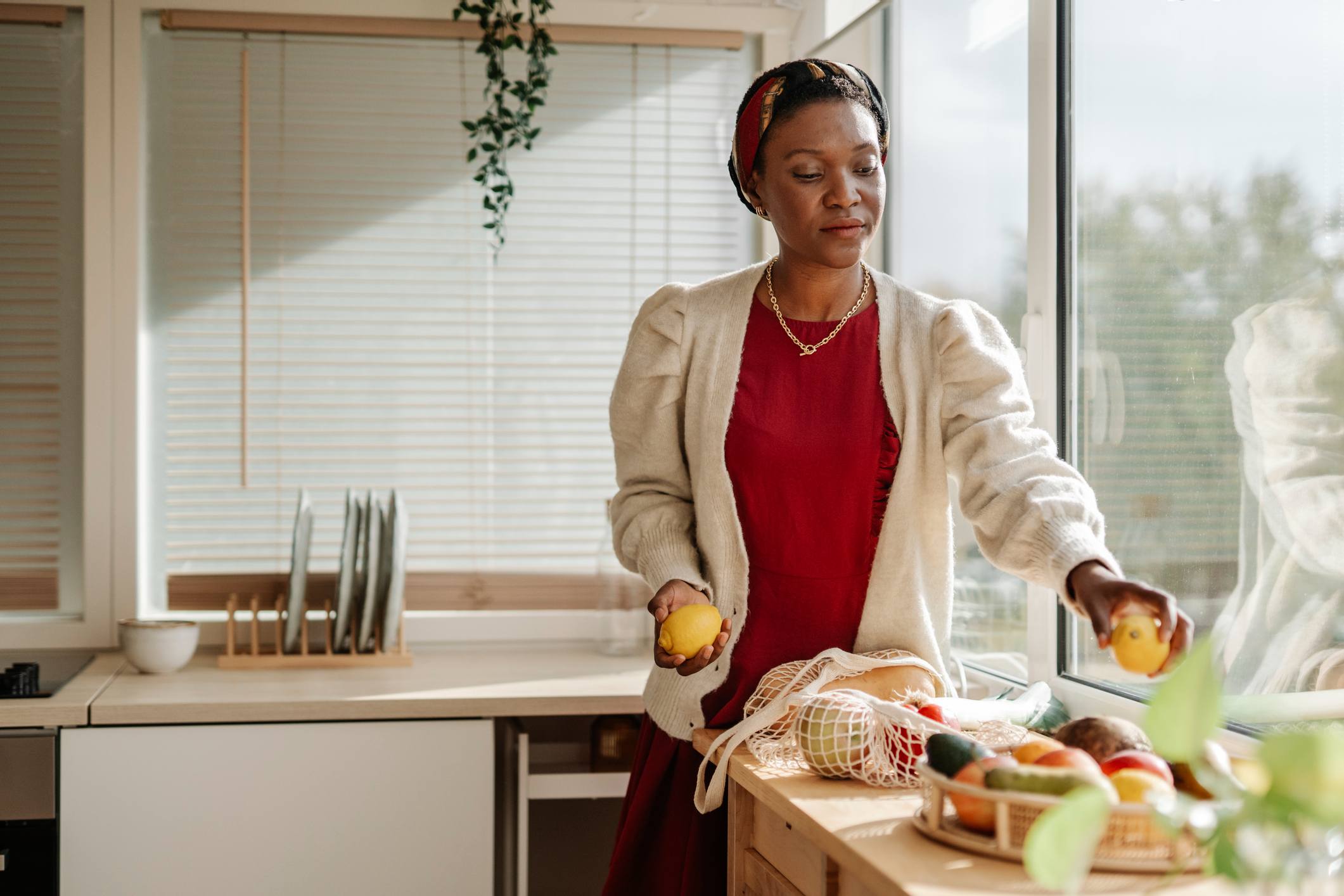 Woman-putting-away-groceries-what-are-personal-health-goals