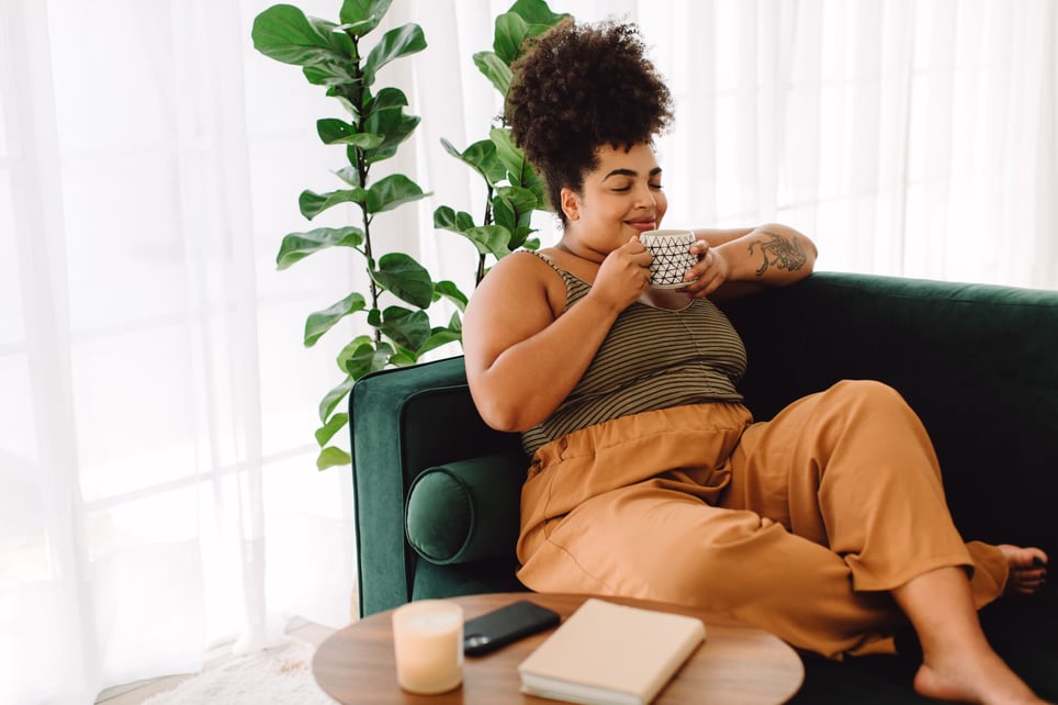 Woman-relaxing-on-sofa-and-having-coffee-things-to-do-with-your-free-time